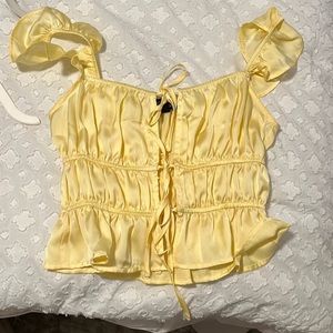 Yellow off the shoulder silky crop top